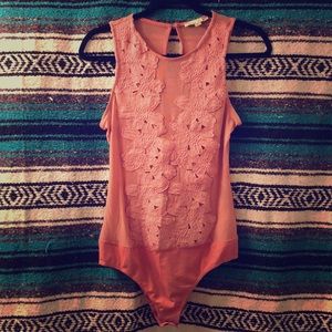 Sheer peach bodysuit